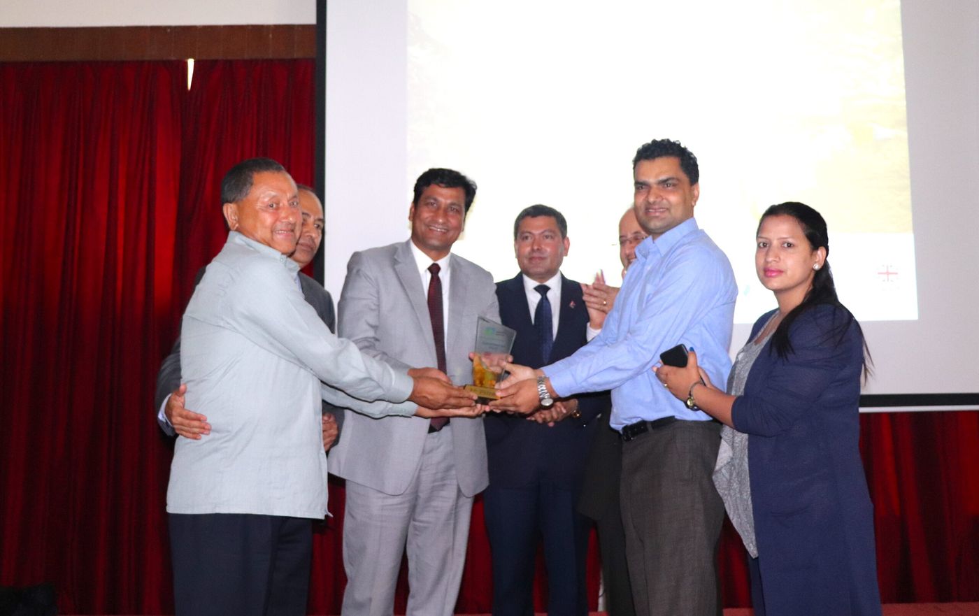 Mr. Sudarshan Khanal from ANSAB & team receiving the “Adaptation at Scale Karyanwayan (Implementation) First Prize” on May 23, 2019 in Kathmandu, Nepal.